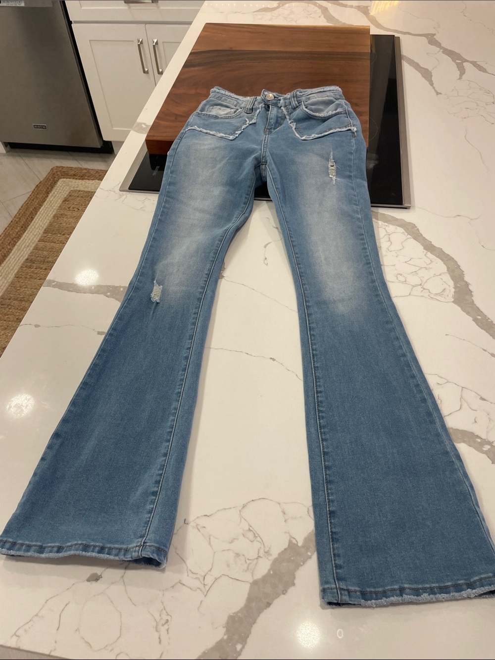 SHEIN Light Blue Distressed Flare Jeans